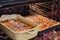 Two Freshly Baked Pies Cooling in the Oven, Homemade Delights