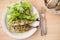 Two freshly barbecued sardines served with bread