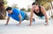 Two friends 30 years old are doing push-ups for endurance