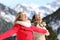 Two friends breathing fresh air in winter in the mountain