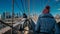 Two friends in New York walk over the famous Brooklyn Bridge