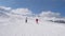 Two Friends Of Sister Skiing Together In The Mountains In Winter