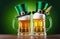 two frothy beer mugs with cylinder hats on green background. St Patrick\\\'s day greeting card