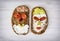 Two funny faces made of tasty bread, humorous creative food