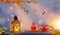 Two funny scary orange halloween pumpkins with glowing eyes onh wood with lantern with spider and a spider web in the background