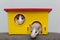 Two funny white and gray tame curious mouses hamsters with shiny eyes looking from bright yellow cage window. Keeping pet friends