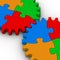 Two gears of colorful jigsaw puzzles