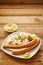 Two German bockwurst sausages with potato salad