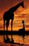 Two giraffe over sunrise