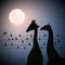 Two giraffes. Birds on wires in city. Animal silhouettes. Full moon