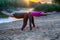 Two girl friends working out together at sunrise