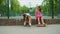 Two girls active passtime in park