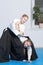 Two girls on Aikido training on white background