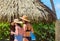 Two girls in bathing suits on the city beach, Rarotonga, Aitutaki, Cook Islands. With selective focus