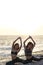 Two girls on the beach doing yoga at sunset. Lima Peru.