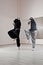 Two girls dancing synchronously