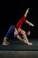 Two girls doing acrobatics in the sports Studio .