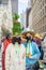 Two girls in elaborate Easter hats pose during the Easter Bonnet Parade