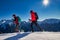 Two girls go on a snow hike in technical clothing