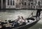 Two girls in gondola on Grand Canal