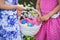 Two Girls Hands Holding an Easter Basket - Close Up