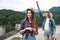 Two girls in hats traveling and hitchhiking