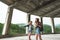 Two girls in hats traveling through ruins