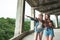 Two girls in hats traveling through ruins