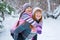 Two girls having fun in winter