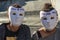 Two girls with masks on climate change protest march