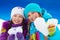 Two girls portrait holding snow hearts