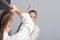 Two girls practice sword on Aikido training