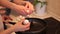 Two girls prepare an omelet at home in the kitchen