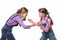 Two girls quarrel and fight with each other on a white background