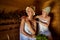 Two girls relaxing in sauna