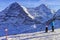 Two girls on ski at winter sport resort in swiss alps