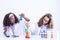 Two girls studying science in classroom at school