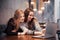 Two girls surfing the net, posting on social networks on a laptop computer and having fun