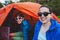 Two girls in a tent.