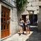 Two girls walking in the historic Diocletian Palace in Split Croatia.