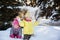 Two girls in winter forest