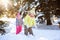 Two girls in winter forest