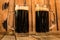 Two glass of fresh dark beer on wooden table