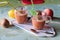 Two glass of fresh fruits smoothie with drinking straw