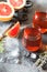 Two glass of grapefruit rose wine and fruits