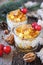 Two glass of rice milk cream  pudding with caramelized apple and praline, New Year dessert,  christmas decoration