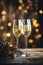 Two glasses of alcoholic champagne on a wooden podium with bokeh effect. Festive party with alcohol. Copy space. New