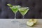 Two glasses of apple martini