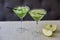 Two glasses of apple martini