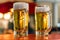 Two glasses with beer on the table, Tokyo, Japan. Close-up.